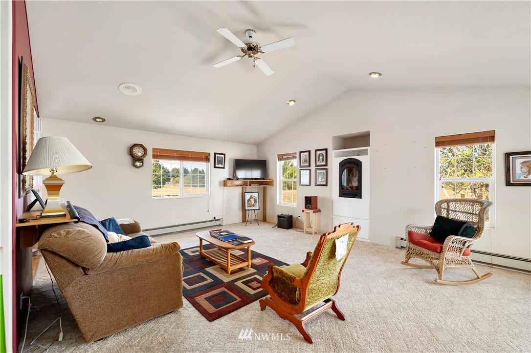 165 Conradi Road Winlock, WA 98596 - Photo 17 of 40 a living room with furniture and a window