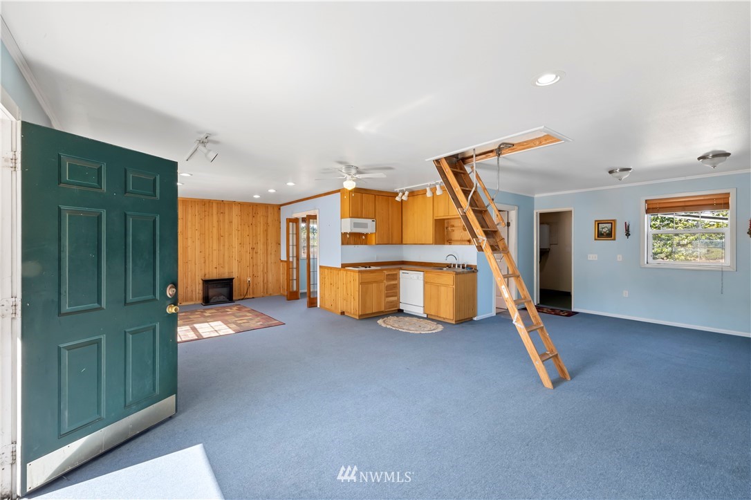165 Conradi Road Winlock, WA 98596 - Photo 31 of 40 a view of an empty room with window and stairs