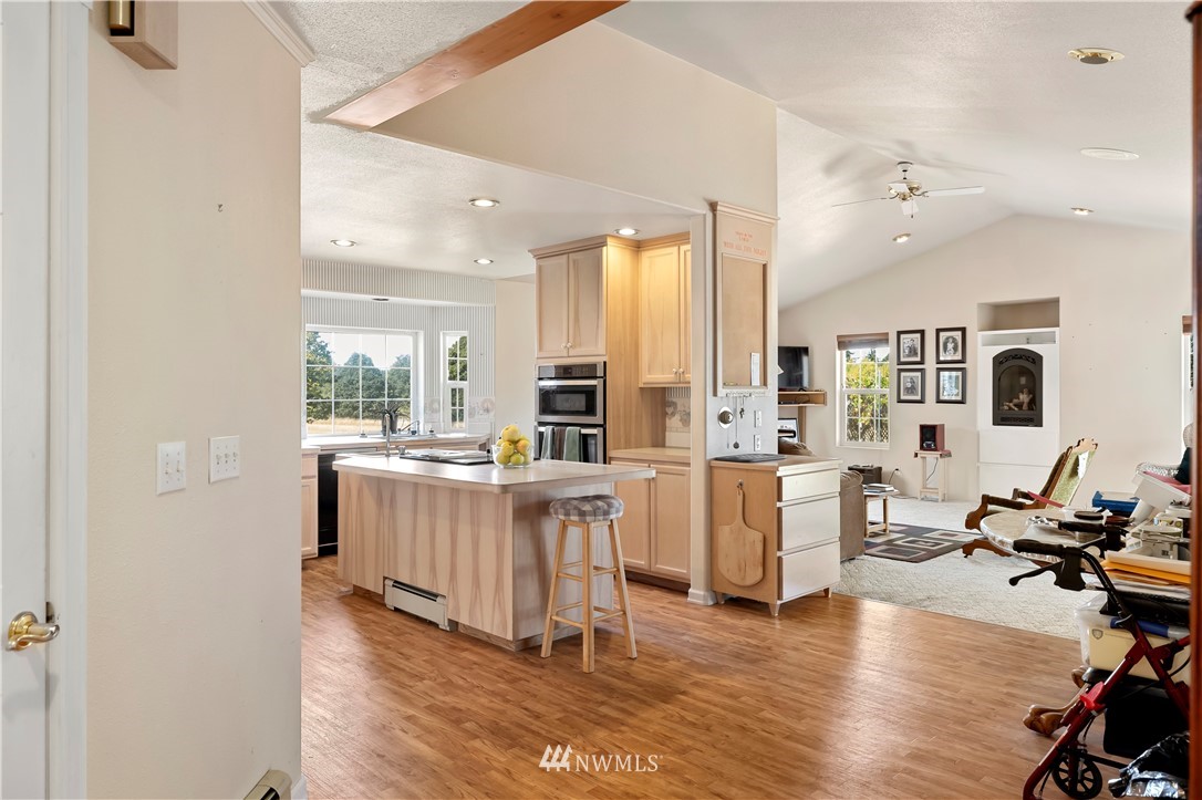 165 Conradi Road Winlock, WA 98596 - Photo 6 of 40 a living room with furniture and large wooden floor