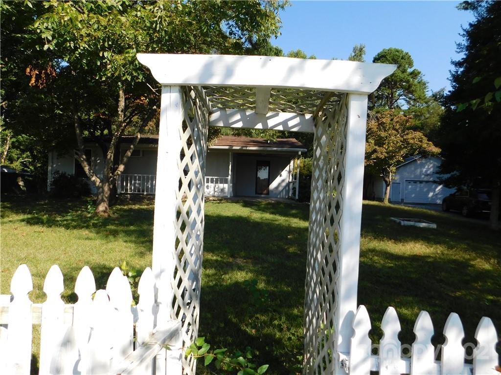 110 Blue Ridge Road Campobello, SC 29322 - Photo 4 of 26 a glass door with trees in front of it
