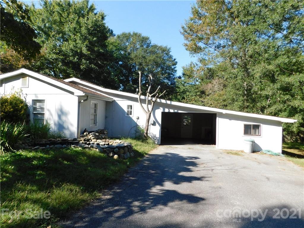110 Blue Ridge Road Campobello, SC 29322 - Photo 6 of 26 a front view of a house with a yard