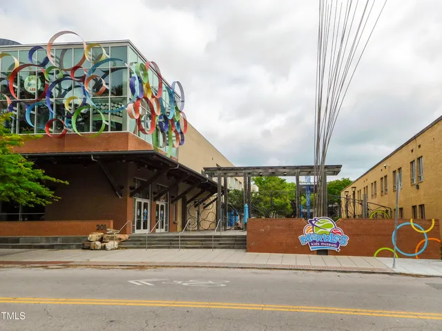 a sign on the side of a street