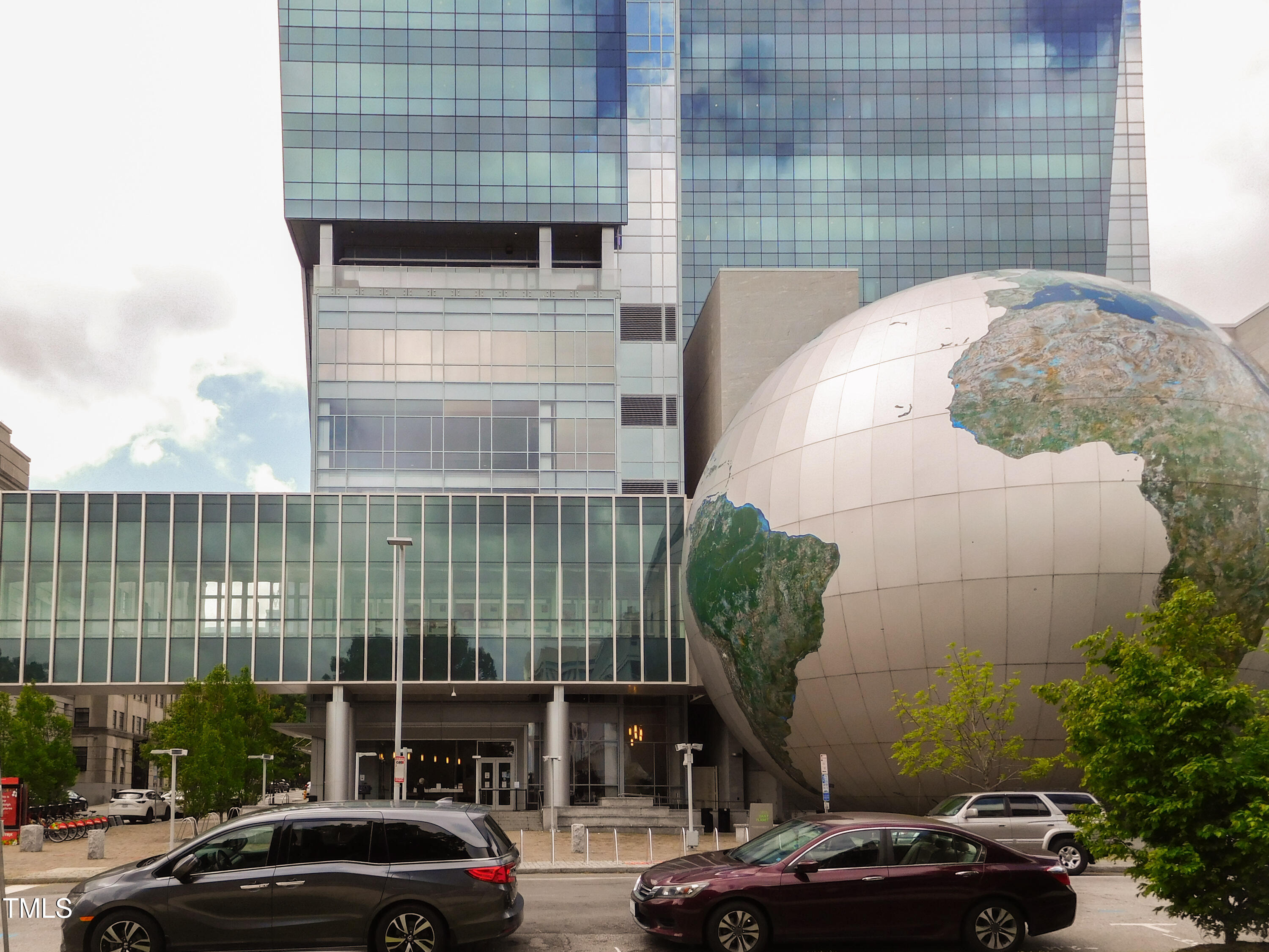1317 Pender Street Raleigh, NC 27610 - Photo 16 of 16 a car parked in front of a building