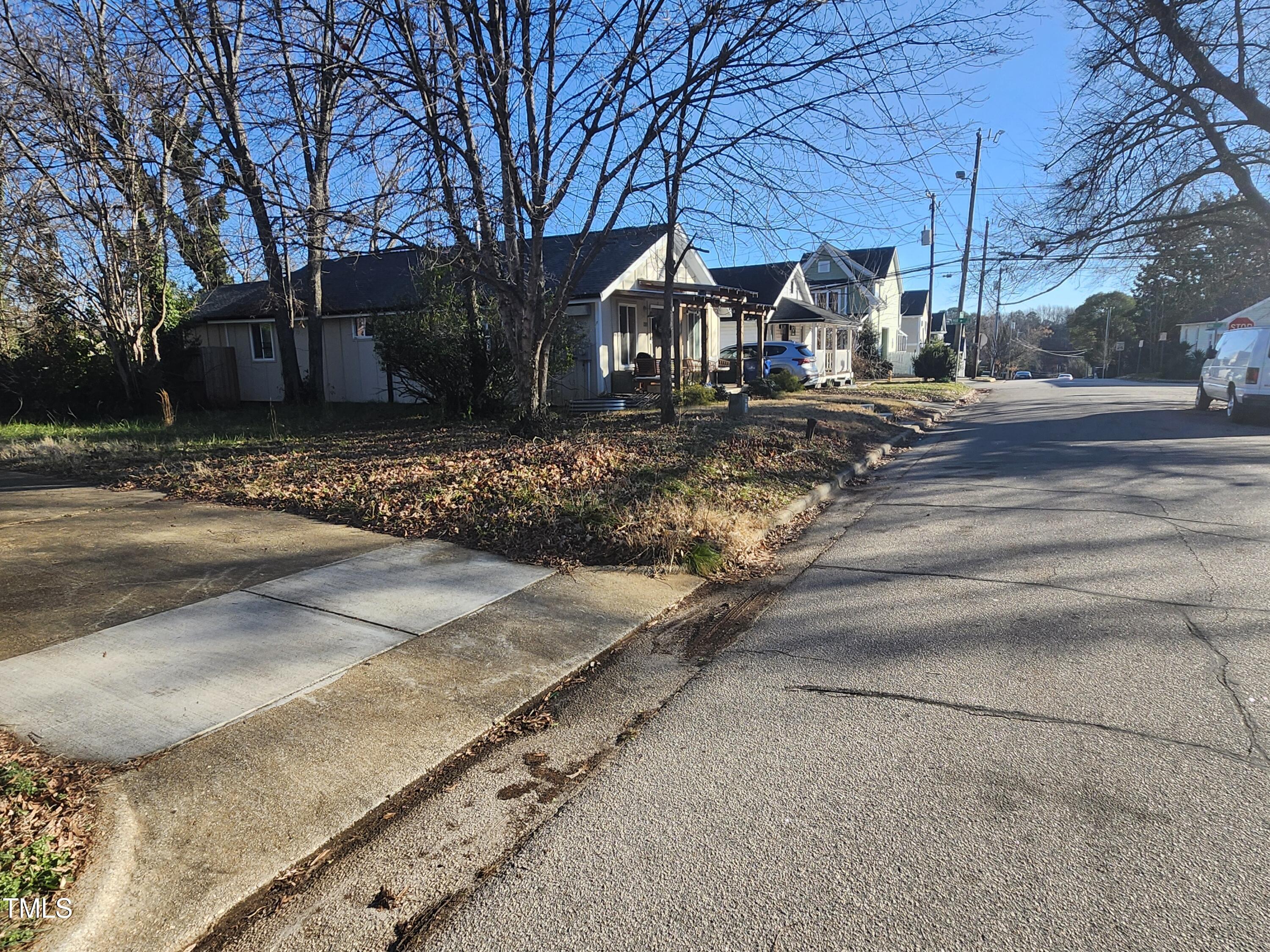 1317 Pender Street Raleigh, NC 27610 - Photo 3 of 16 a view of street with house on its side