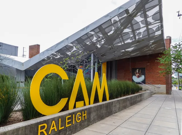 a view of swimming pool with seating area and boat