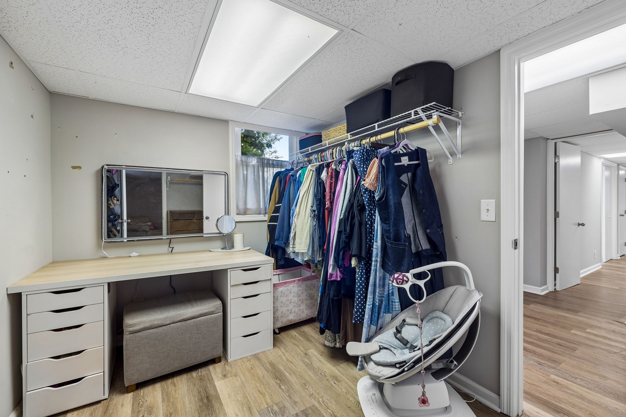 1326 Shahan Road Pleasant View, TN 37146 - Photo 31 of 41 a view of walk in closet with clothes and shoes
