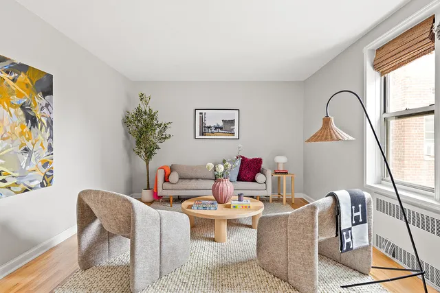 a living room with furniture and window