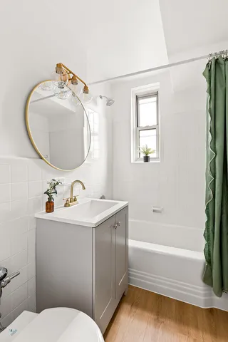 a bed room with a bed and a window