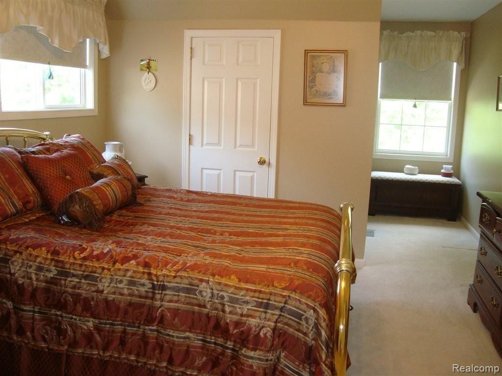 2825 Fenton Road Hartland, MI 48353 - Photo 8 of 14 Master Bedroom