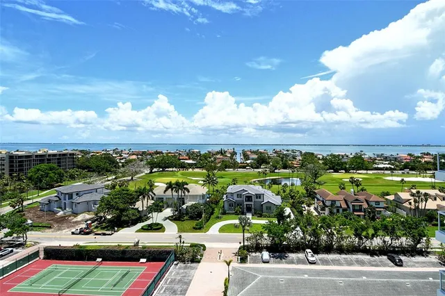 a view of a city with an ocean view