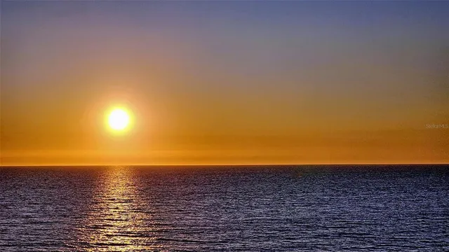 a view of a lake with a terrace