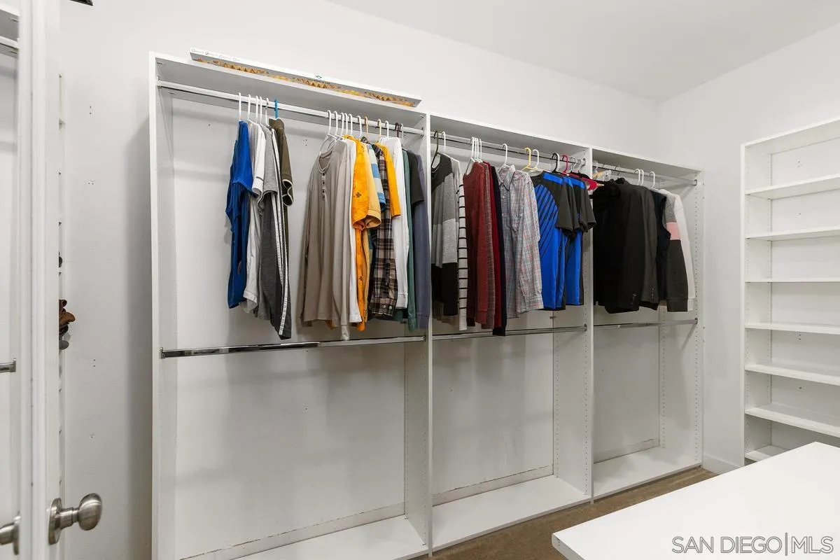 7508 Eagle Drive Santee, CA 92071 - Photo 11 of 22 a view of walk in closet with clothes