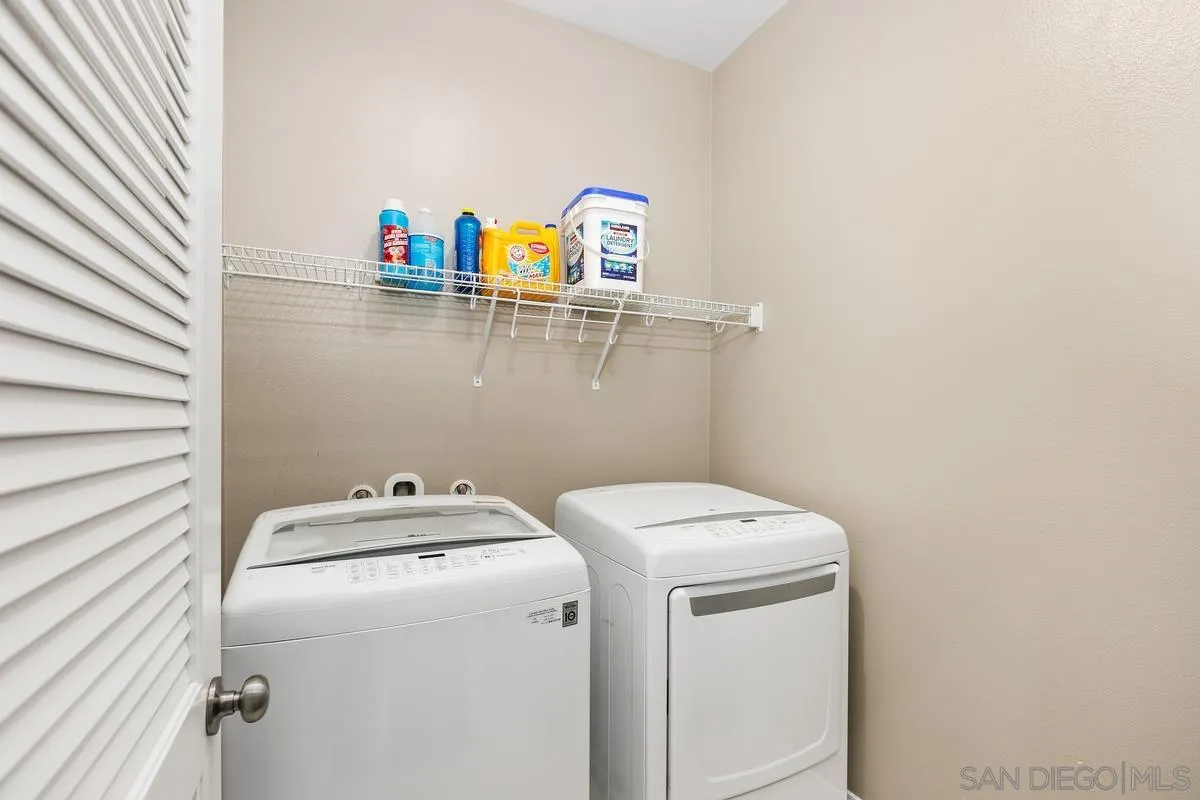 7508 Eagle Drive Santee, CA 92071 - Photo 15 of 22 a utility room with dryer and washer