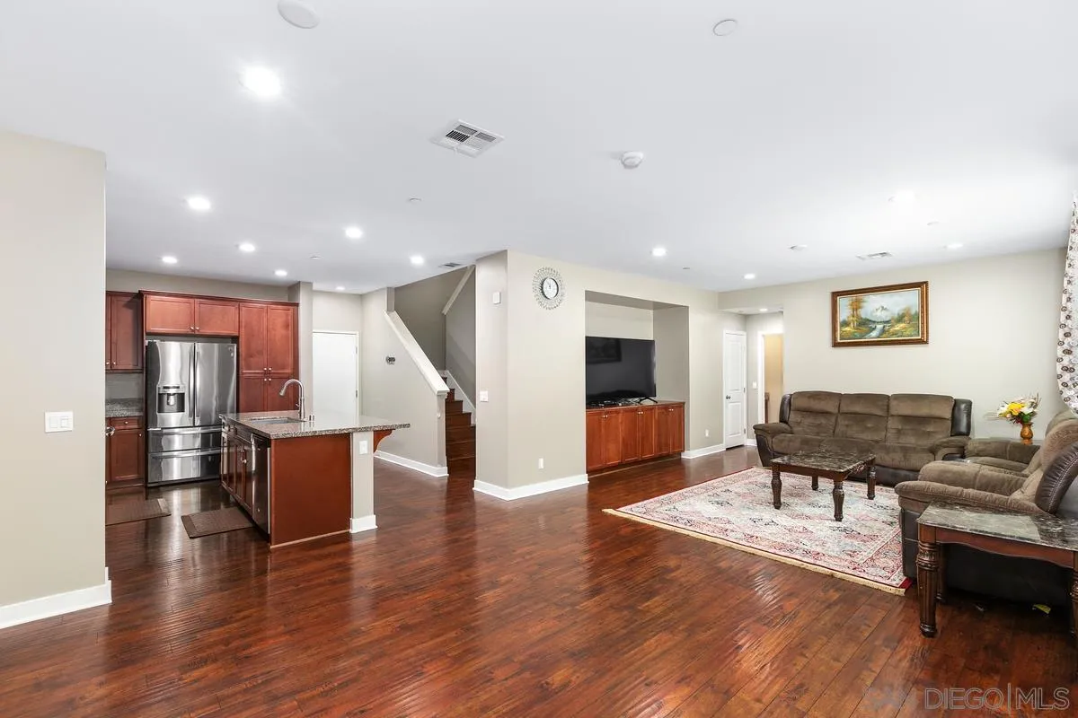 7508 Eagle Drive Santee, CA 92071 - Photo 3 of 22 a living room with furniture and a wooden floor