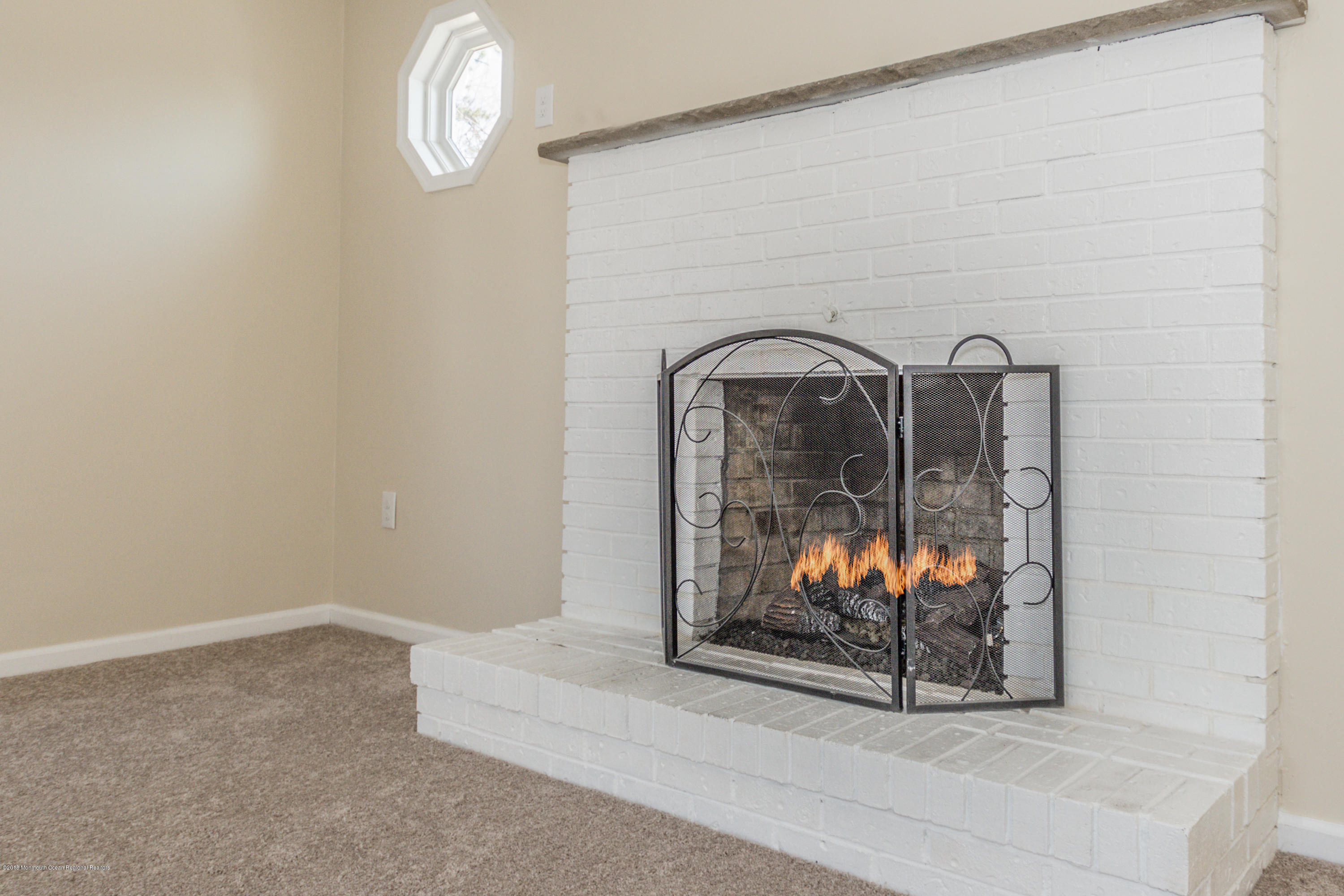 2002 Whitcomb Road Forked River, NJ 08731 - Photo 13 of 34 Fireplace-Fire