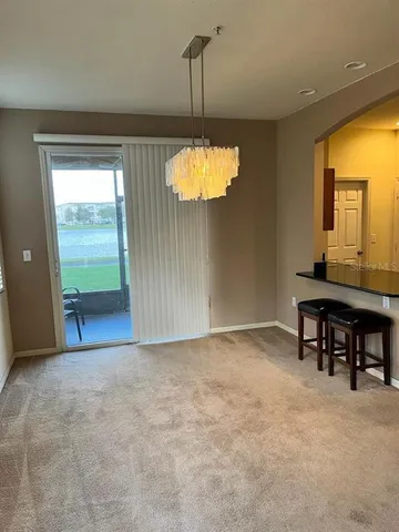 a view of a livingroom with furniture