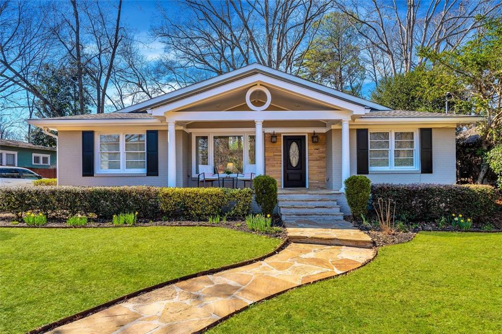 316 Adair Street Decatur, GA 30030 - Photo 1 of 1 a front view of a house with a yard