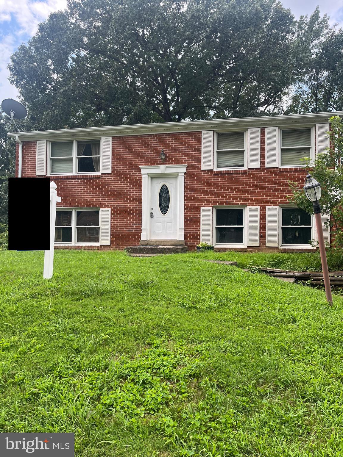 13790 Meadowbrook Road Woodbridge, VA 22193 - Photo 1 of 1 a front view of house with yard and green space