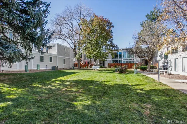 a view of a house with a big yard
