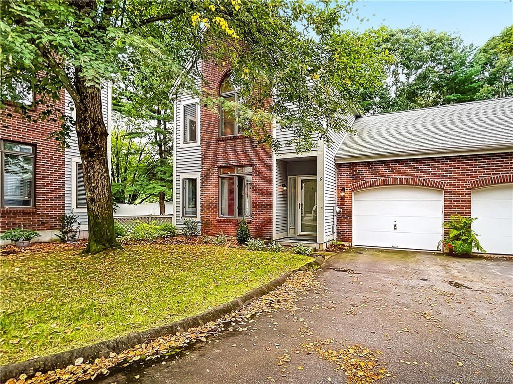 a front view of house with yard