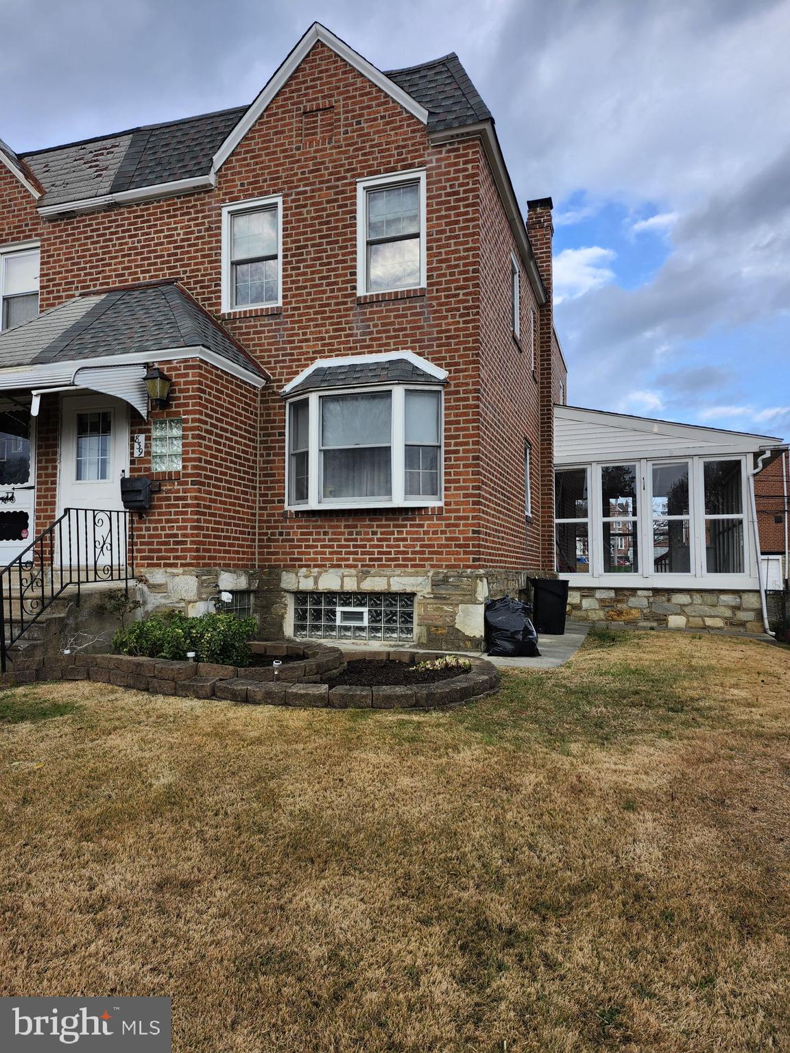 839 Medway Road Philadelphia, PA 19115 - Photo 2 of 3 a front view of a house with a yard
