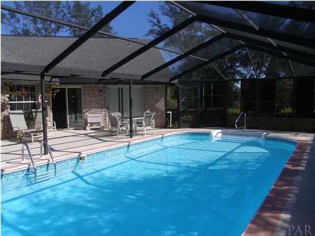 2597 Crescent Road Navarre, FL 32566 - Photo 3 of 22 Enclosed pool.