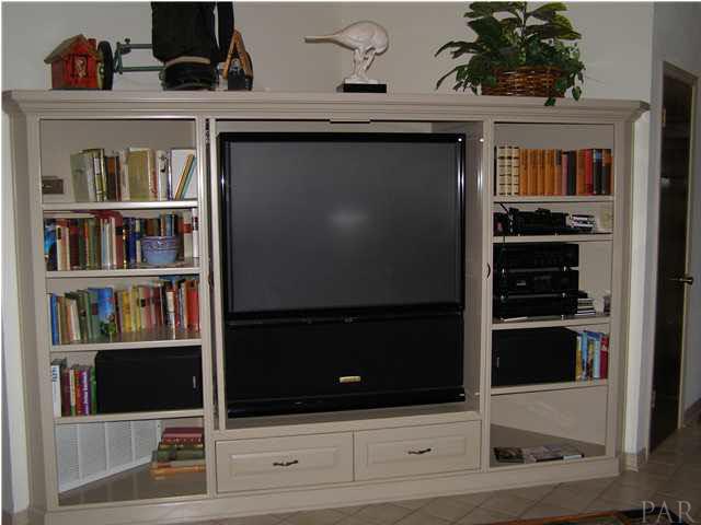 2597 Crescent Road Navarre, FL 32566 - Photo 9 of 22 This big-screen TV & entertainment center conveys with the property.