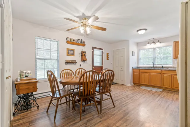 a kitchen with stainless steel appliances granite countertop a refrigerator and cabinets