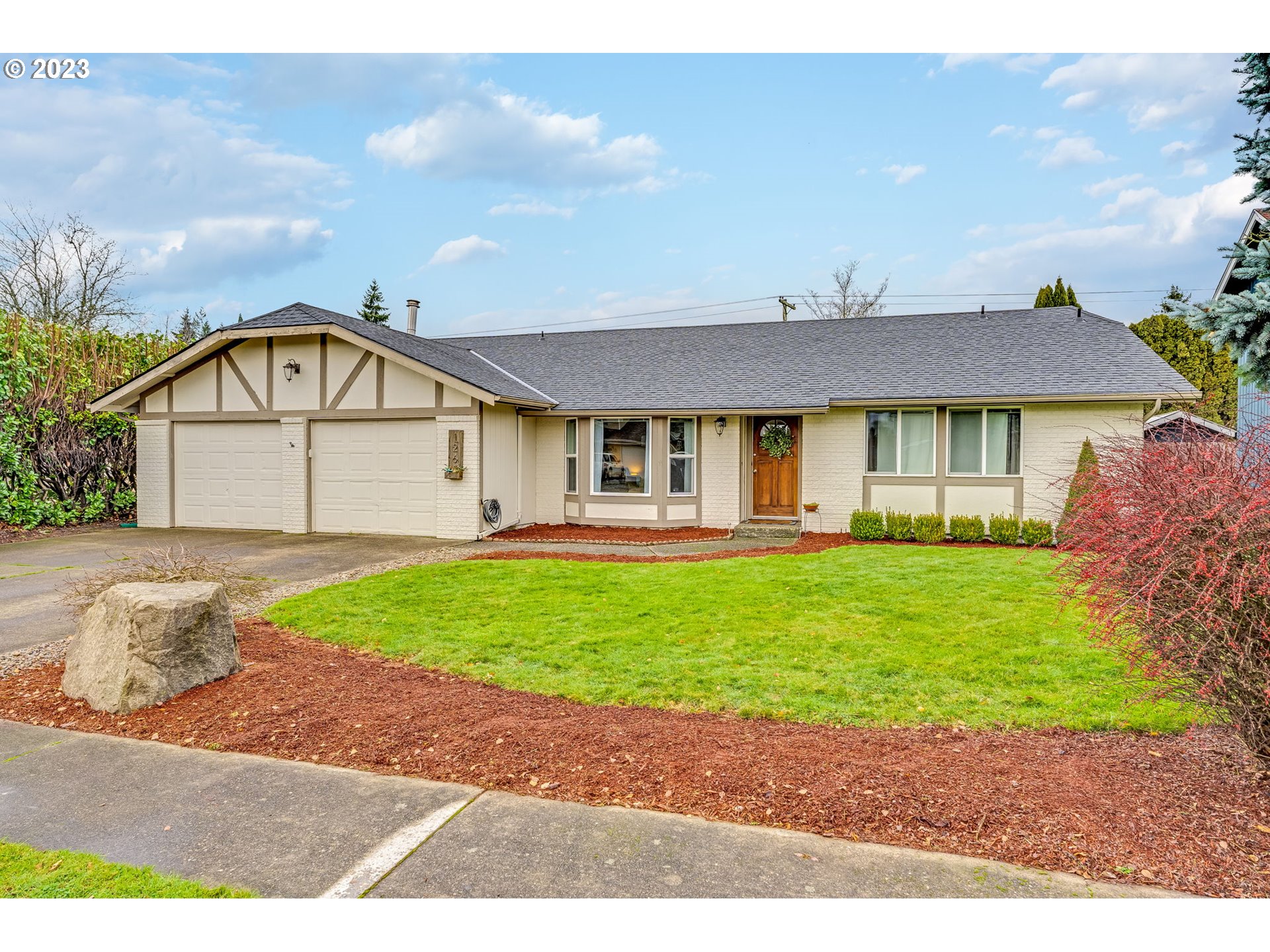126 Villa Road Kelso, WA 98626 - Photo 2 of 41 a view of a big house with a garden and pathway