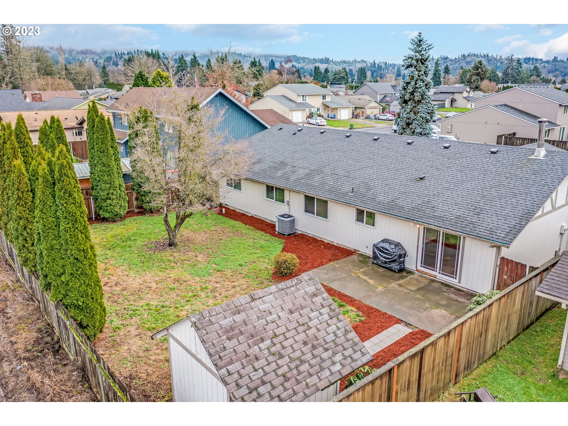 126 Villa Road Kelso, WA 98626 - Photo 38 of 41 an aerial view of residential houses with outdoor space and pool
