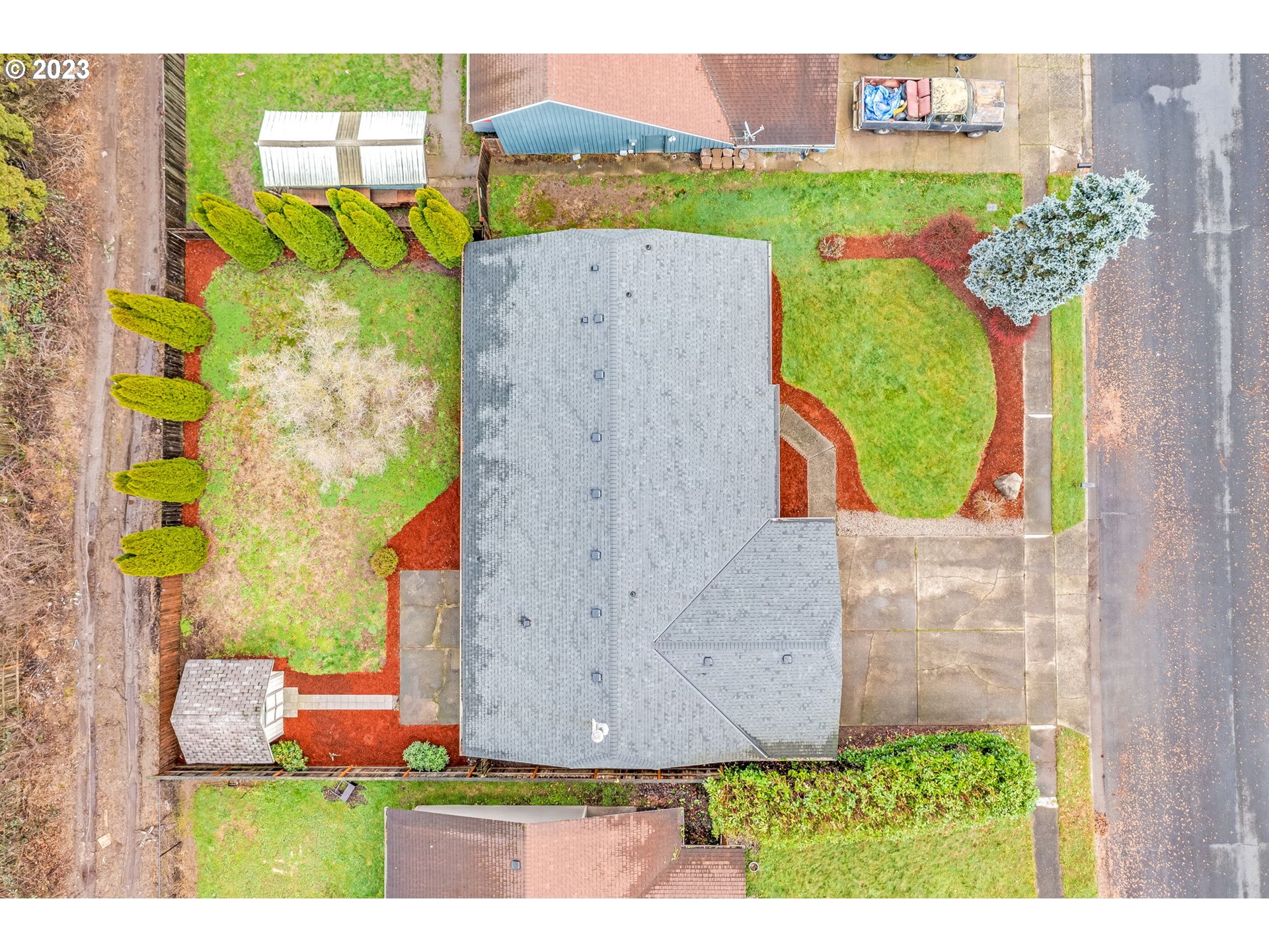 126 Villa Road Kelso, WA 98626 - Photo 40 of 41 a view of a house with a garden and a car parked