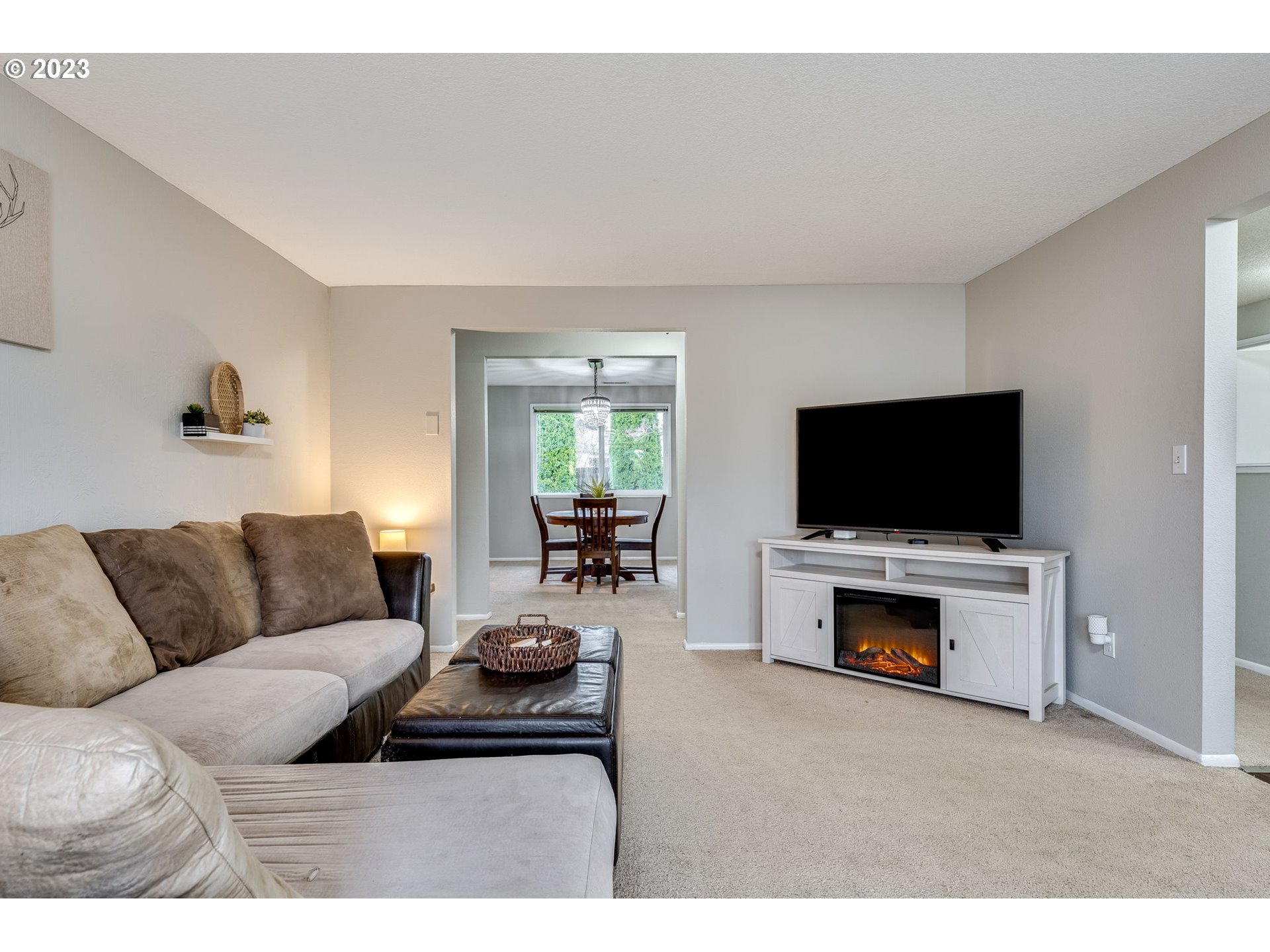 126 Villa Road Kelso, WA 98626 - Photo 7 of 41 a living room with furniture and a flat screen tv