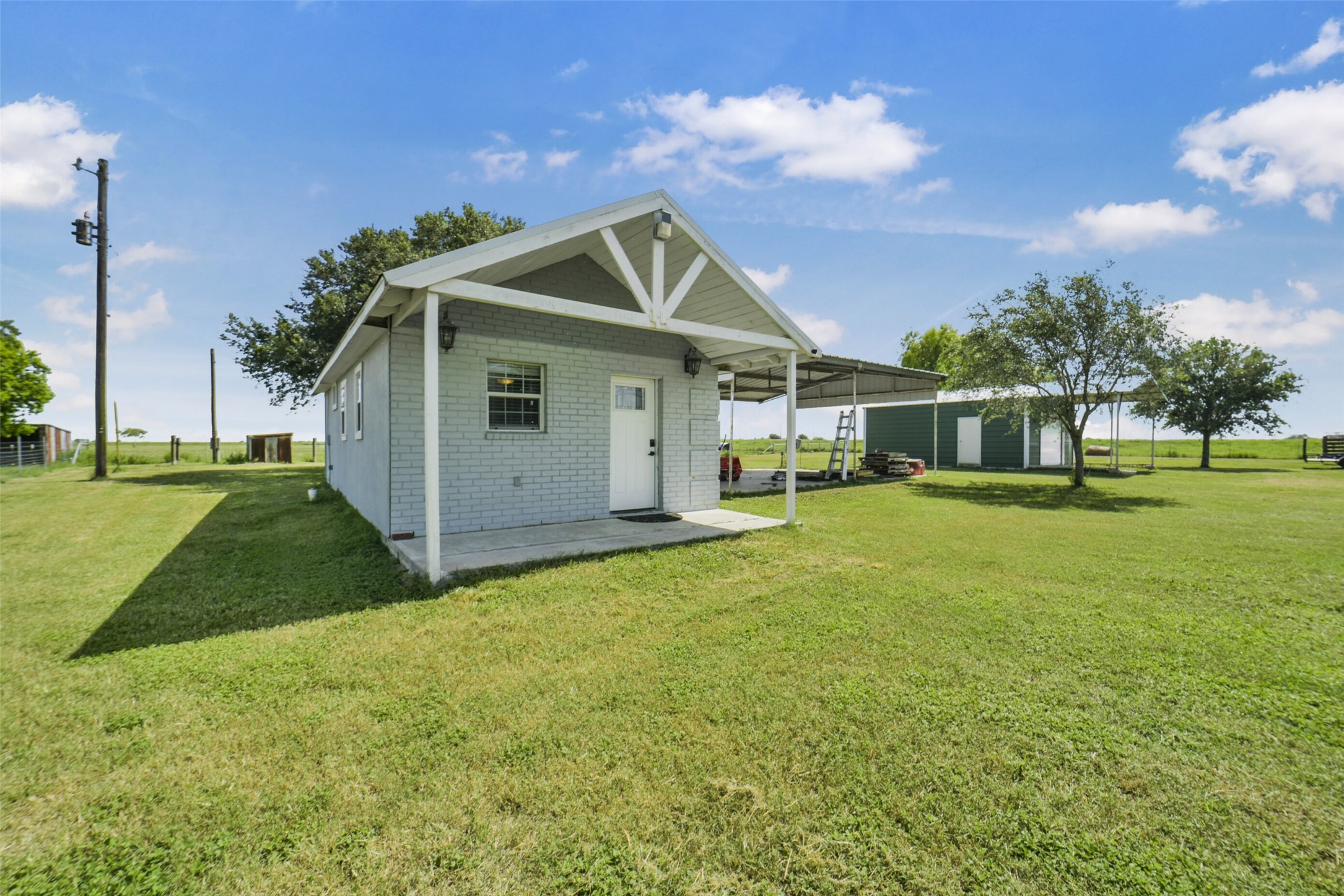 11301 South FM 441 Road El Campo, TX 77437 - Photo 26 of 43 Also on the property is a 512 sq ft white brick Guest house that includes 1 bedroom, 1 bath and a kitchenette with a covered porch. The Guest house could be used for an Airbnb.