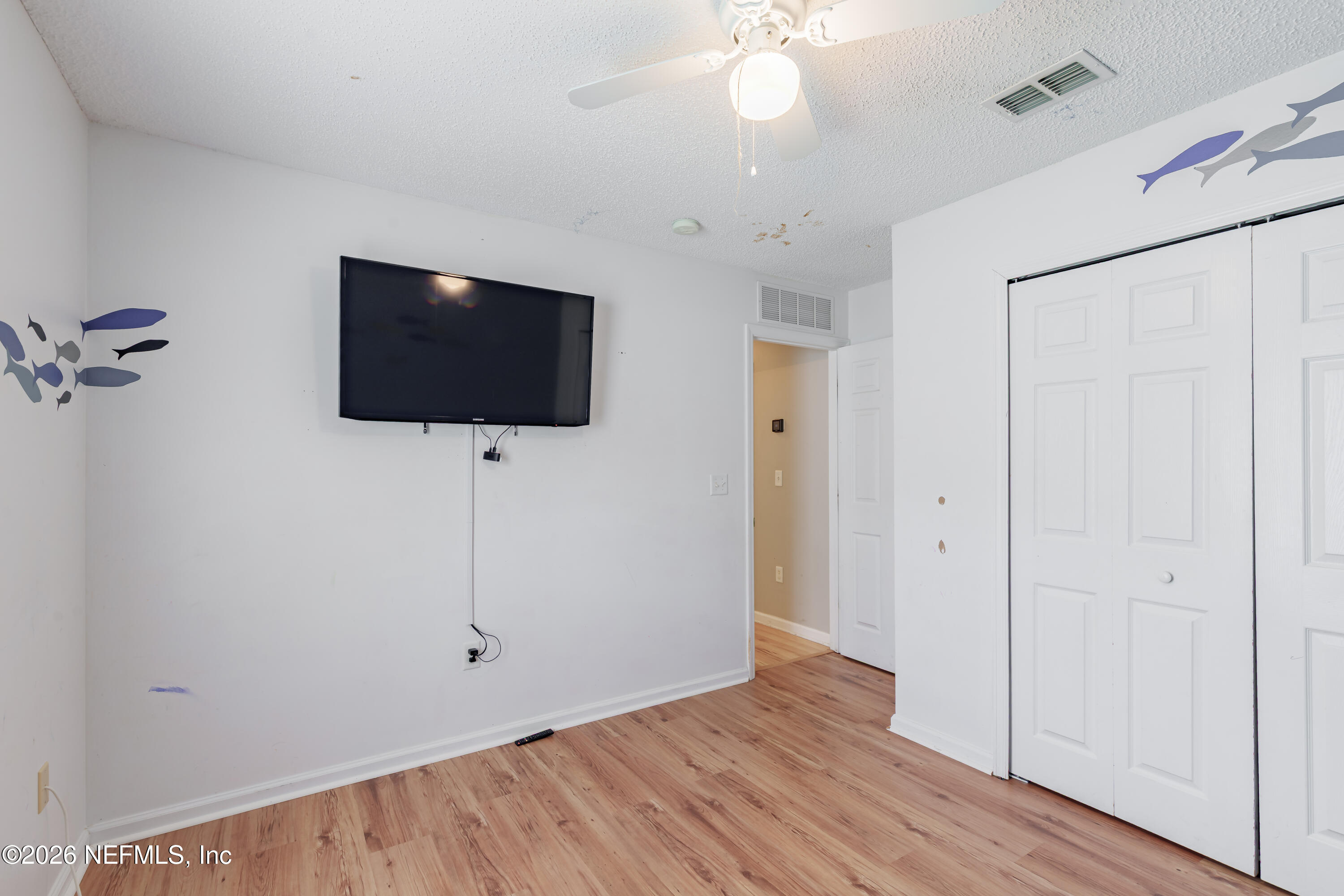 673 MacKenzie Circle St. Augustine, FL 32092 - Photo 14 of 28 wooden floor in an empty room