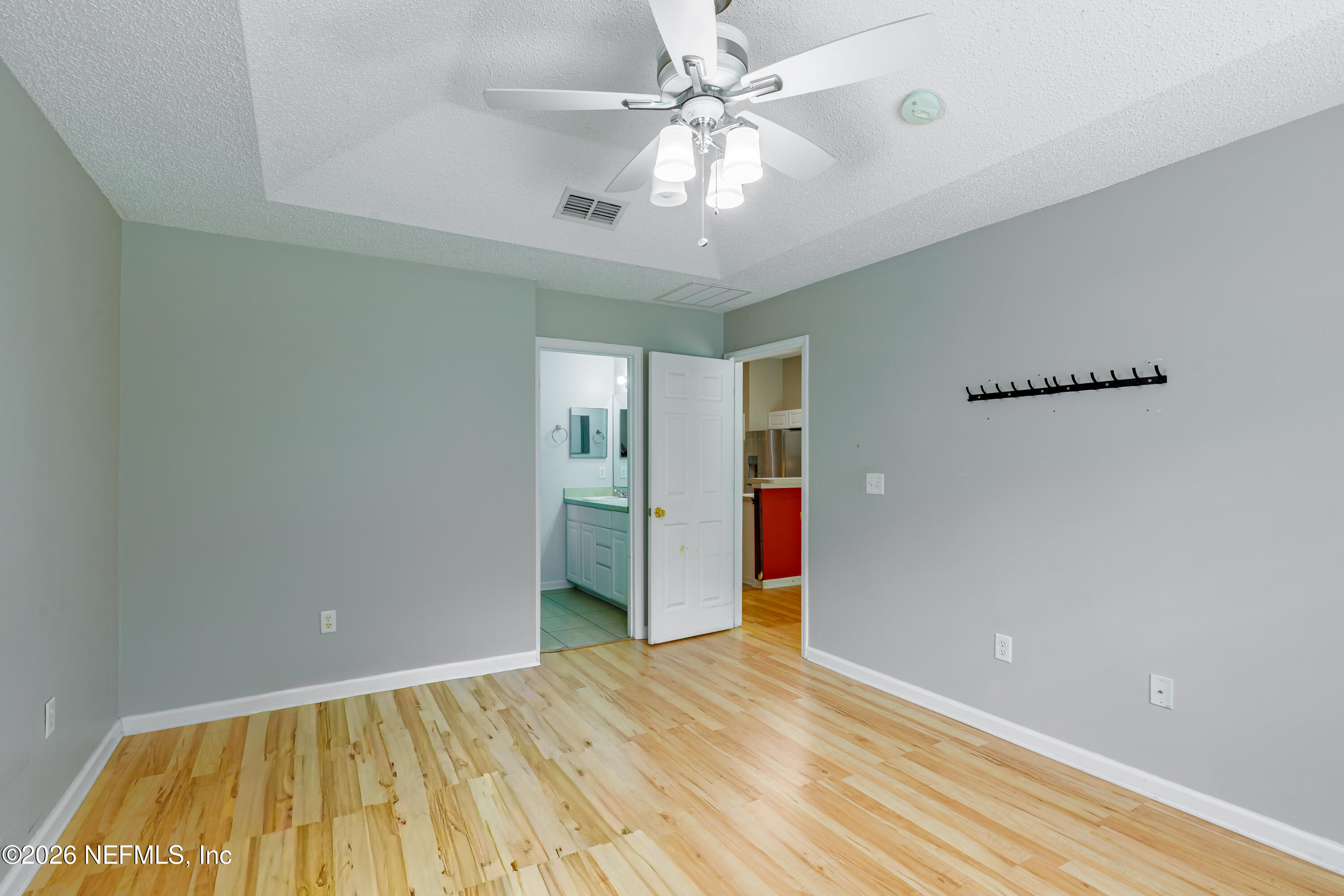 673 MacKenzie Circle St. Augustine, FL 32092 - Photo 21 of 28 a view of empty room with wooden floor