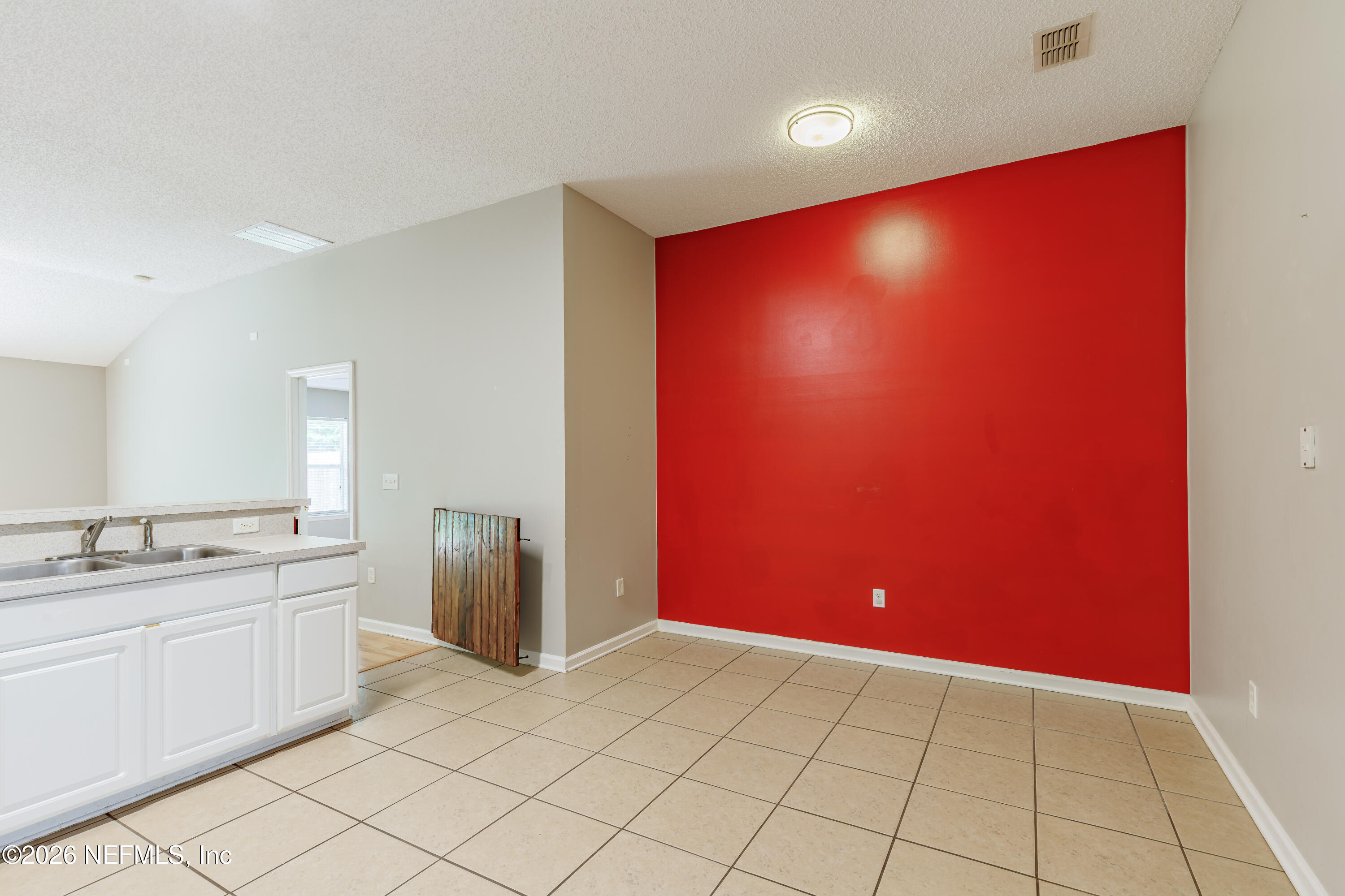 673 MacKenzie Circle St. Augustine, FL 32092 - Photo 8 of 28 a view of an empty room and window