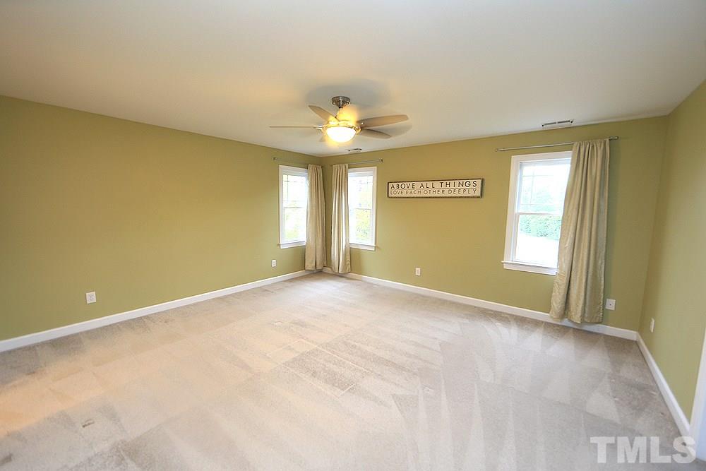 2108 Karns Place Raleigh, NC 27614 - Photo 11 of 26 a view of an empty room with a window