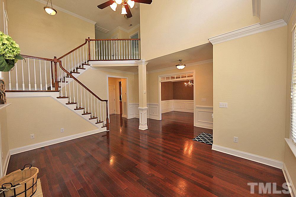 2108 Karns Place Raleigh, NC 27614 - Photo 5 of 26 a view of entryway and hall with wooden floor