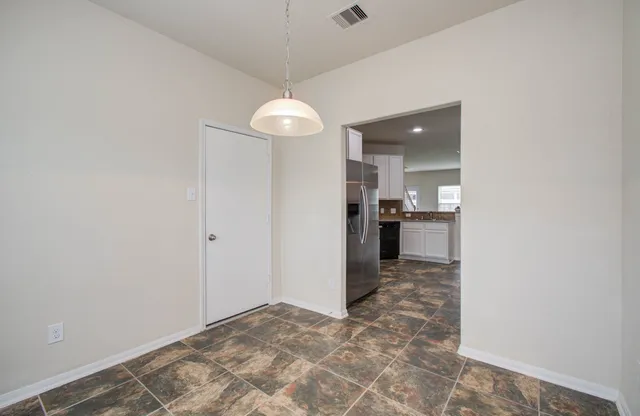 a view of kitchen and utility room