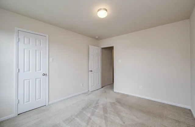 a bathroom with a sink vanity and a mirror