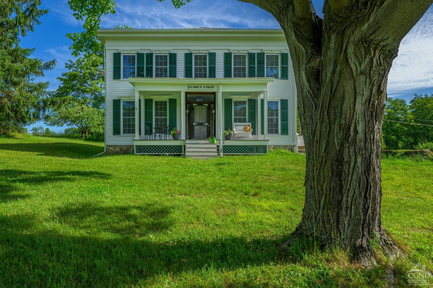235 Slate Hill Road Ghent, NY 12037 - Photo 1 of 38 front view of a house with a yard