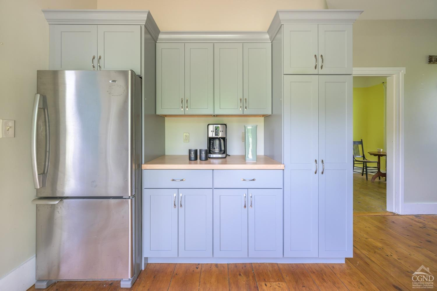 235 Slate Hill Road Ghent, NY 12037 - Photo 19 of 38 a kitchen with stainless steel appliances a refrigerator and a sink