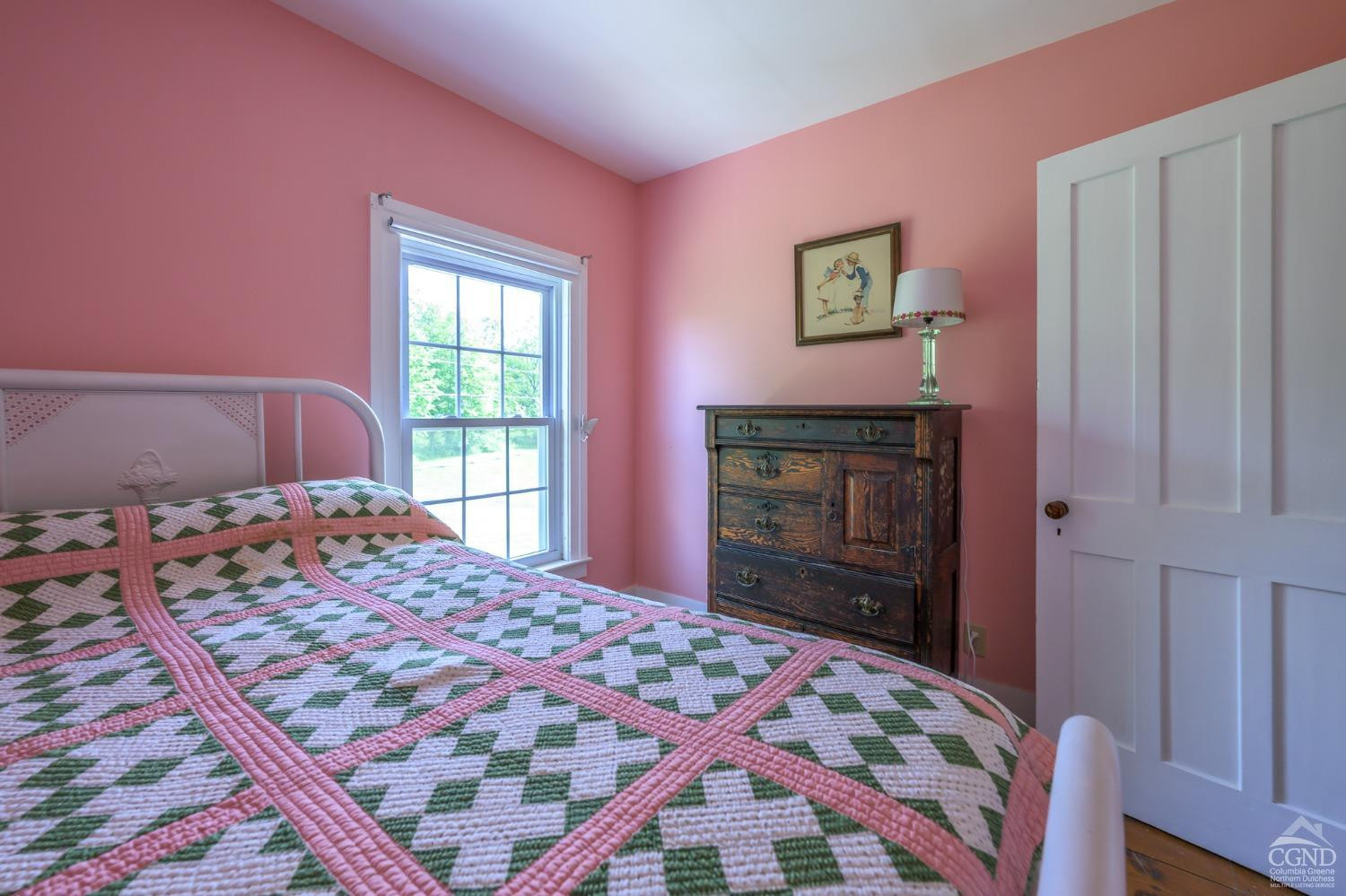 235 Slate Hill Road Ghent, NY 12037 - Photo 29 of 38 a bedroom with a bed and a dresser
