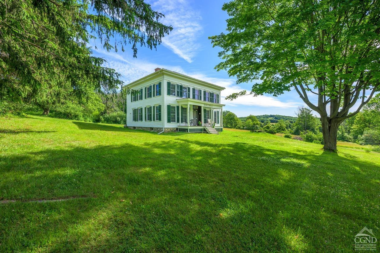 235 Slate Hill Road Ghent, NY 12037 - Photo 3 of 38 a view of a house with a big yard