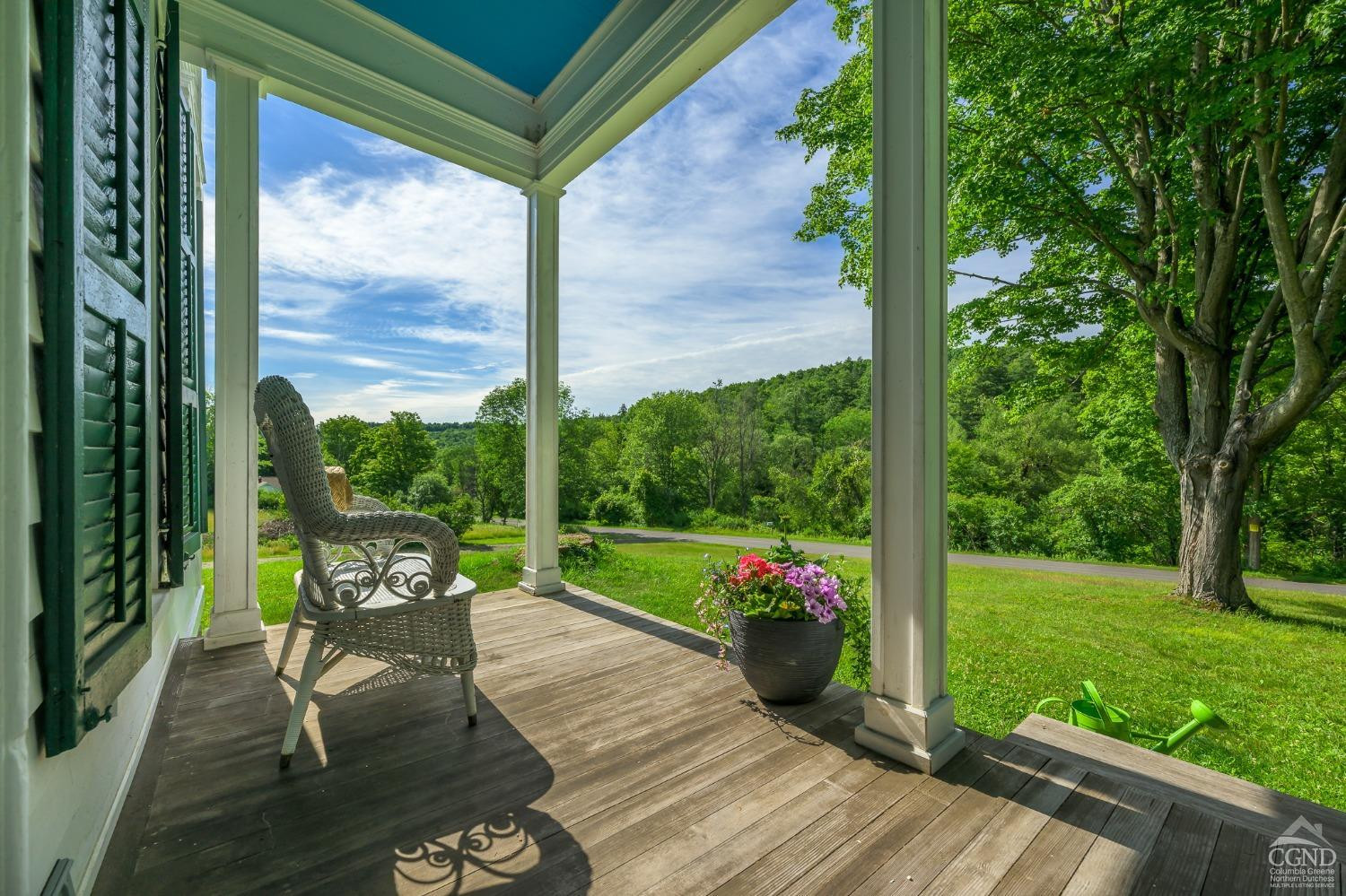 235 Slate Hill Road Ghent, NY 12037 - Photo 6 of 38 a garden view with a seating space