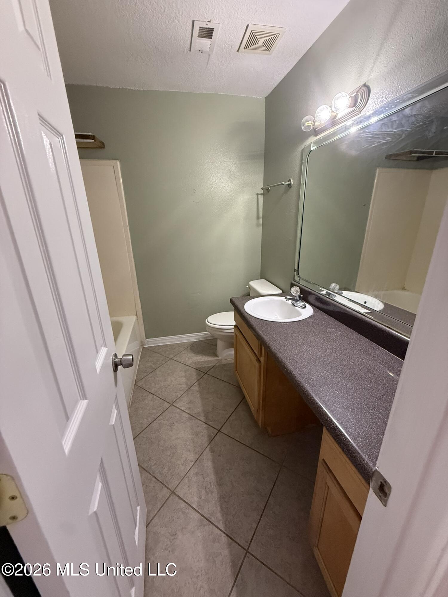 1625 Martin Bluff Road, Unit 54 Gautier, MS 39553 - Photo 8 of 13 IMG_9420