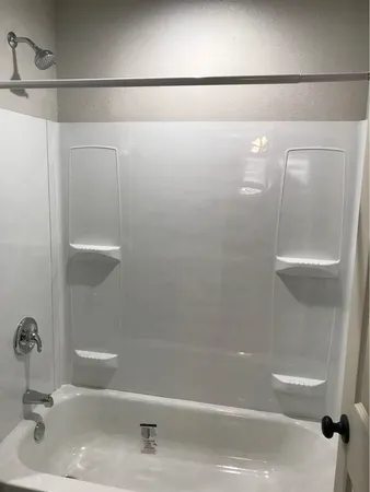 a bathroom with a bathtub