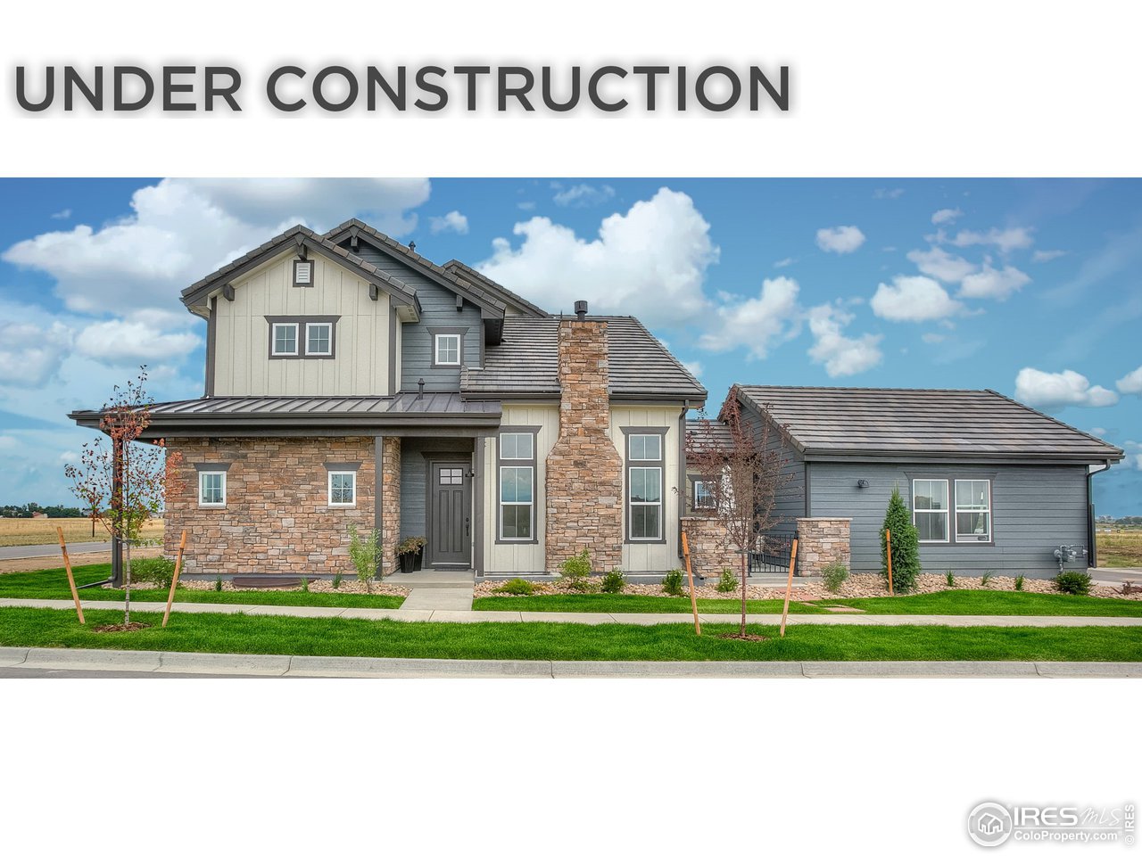 1547 Stoneseed Street Berthoud, CO 80513 - Photo 1 of 39 a front view of a house with garden