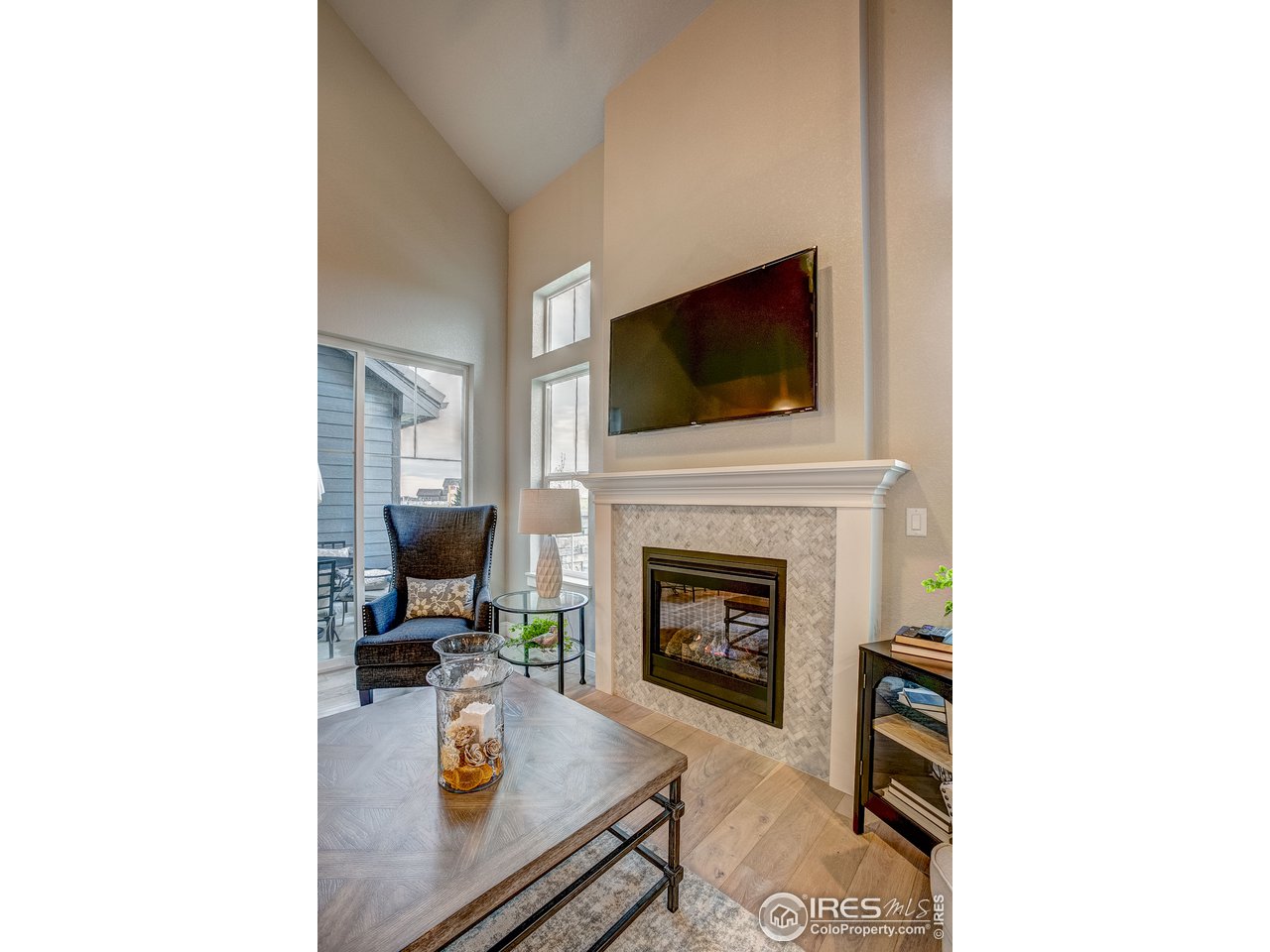 1547 Stoneseed Street Berthoud, CO 80513 - Photo 7 of 39 a living room with furniture and a fireplace