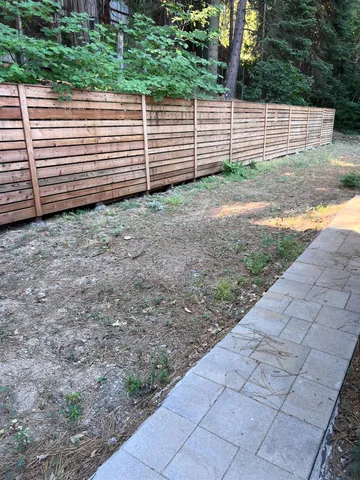 a view of a house with a back yard